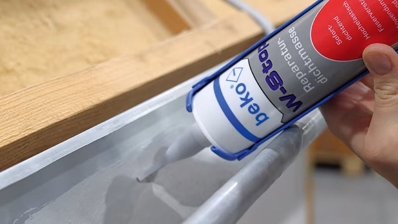 W-Stop Reparaturdichtmasse 310 ml grau Person